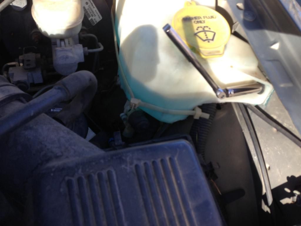 How to Replace Washer Fluid Pump with Photos