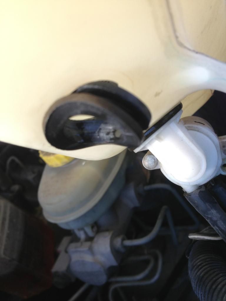 How to Replace Washer Fluid Pump with Photos