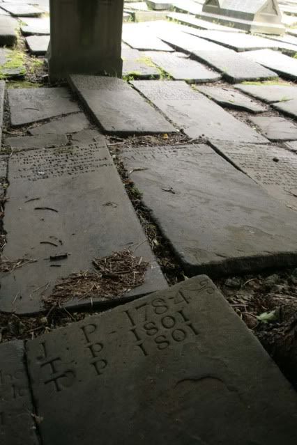 Ancient tombstones in Heptonstall's churchyard.