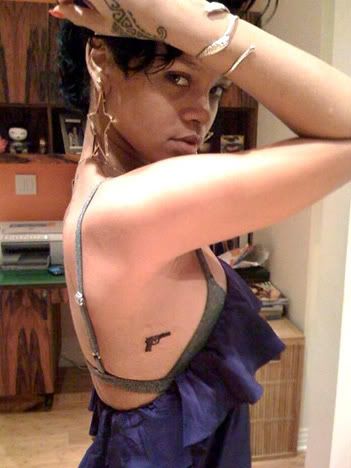 Rihanna Tattoo On Ear. rihanna ear piercings what