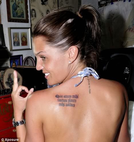 Thumbs up Danielle Lloyd has the Latin phrase tattooed on her
