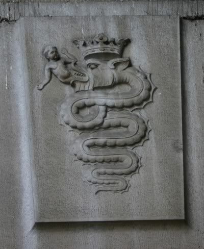 Coat of arm’s at Milan Central Station. That nasty looking serpent is eating a child… Or is it giving birth to it? Can it represent the Bloodline?